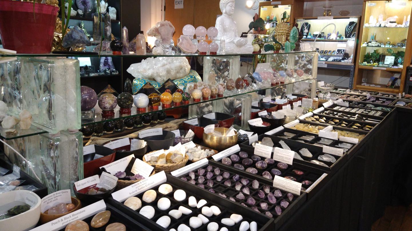 Table and shelves of product, mostly polished material